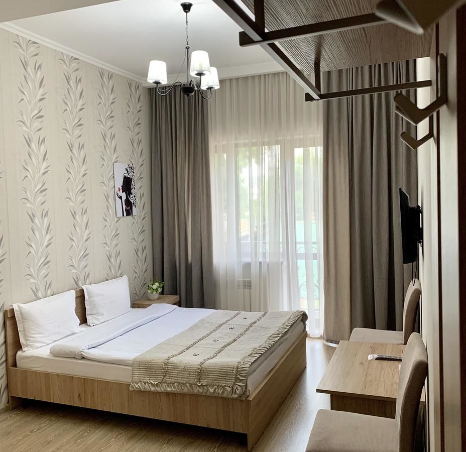 Отель Bastau Hotel Алматы